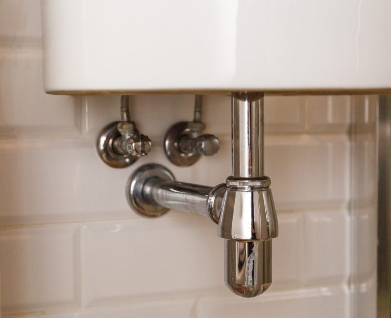 Basin siphon or sink drain in a bathroom, clean Basin siphon or sink drain in a bathroom, clean.