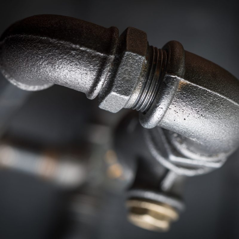 Detail of steel pipes. Detailed picture. Selective focus.